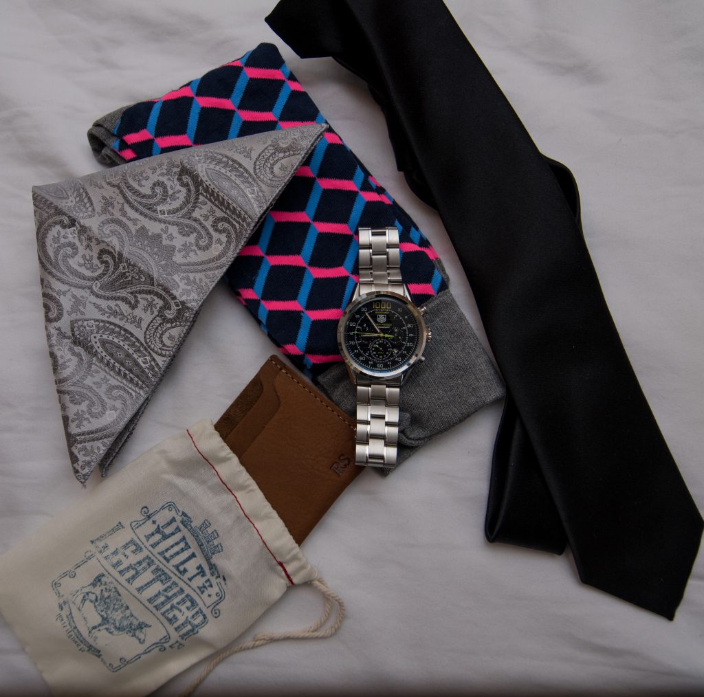 groom wedding accessories flat lay