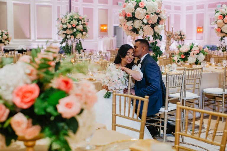 indian couple enjoying their wedding reception